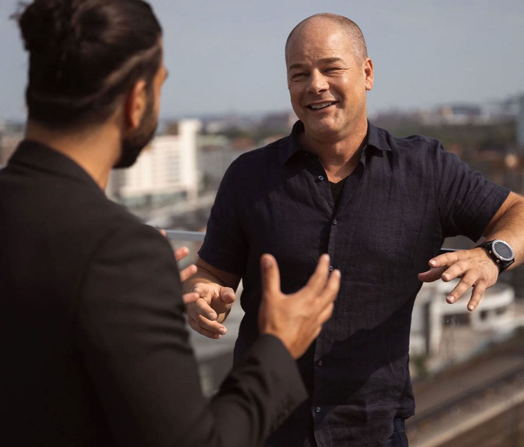 Tommy Strand, Chief Network Architect at Telia, is seen talking to one of his colleagues.